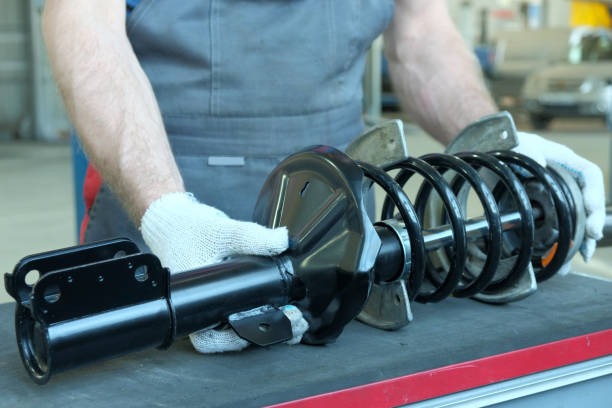 Automotive technician repairing car engine systems