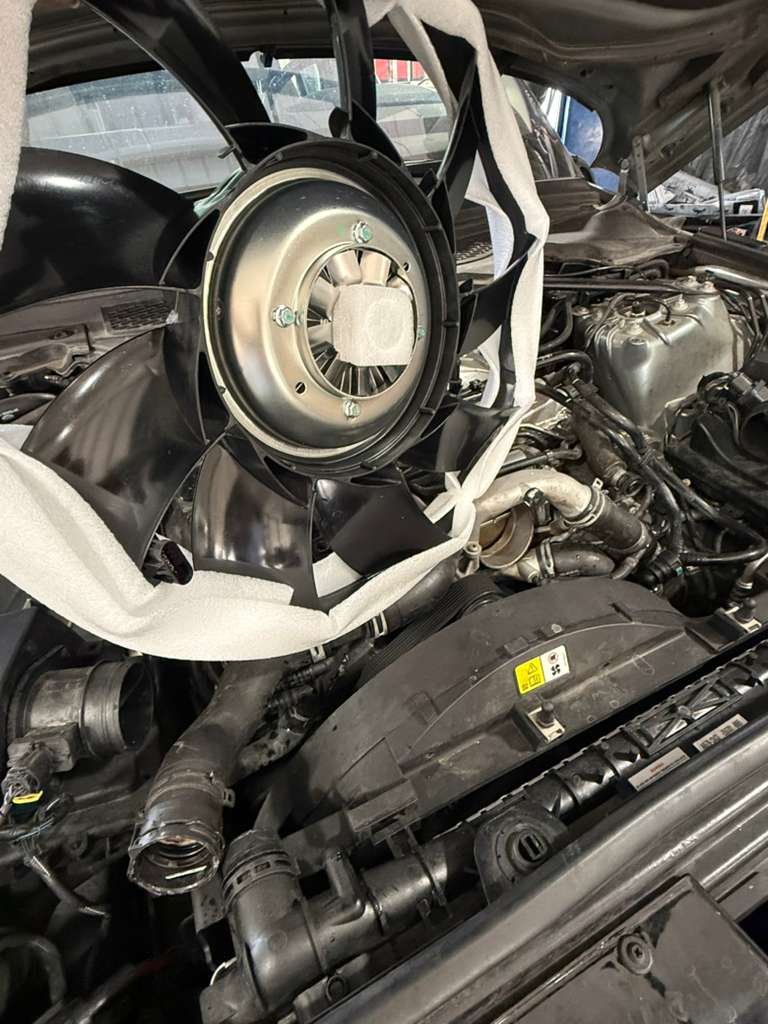 Replacement engine cooling fan assembly in a vehicle at Busy Bots Auto Repair in Las Vegas